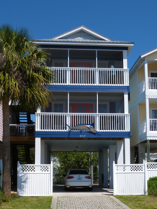 view of the 3-story building from the road